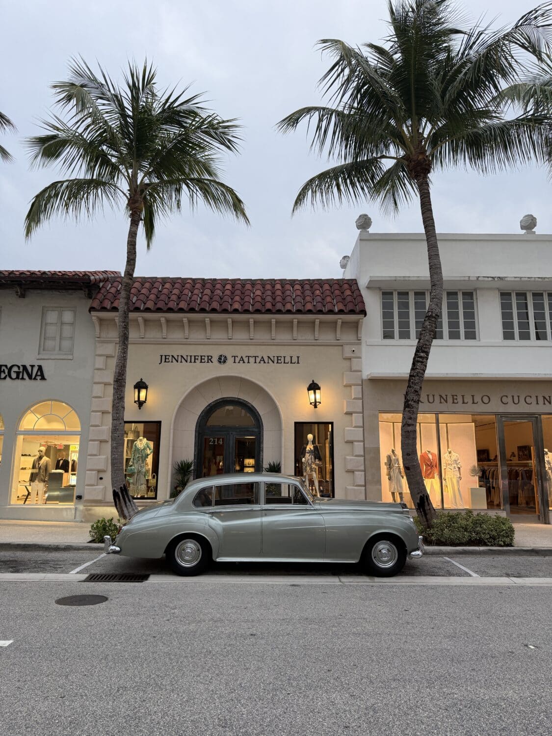 Antique Rolls-Royce on Worth Avenue in Palm Beach in front of Jennifer Tattenelli, Bruno Cucinelli, and Zegna.