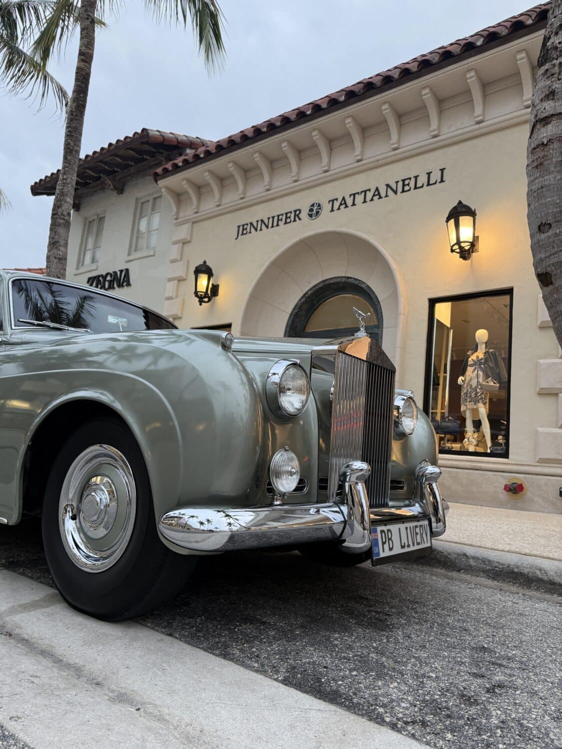 Antique Rolls-Royce on Worth Avenue in Palm Beach in front of Jennifer Tattenelli.